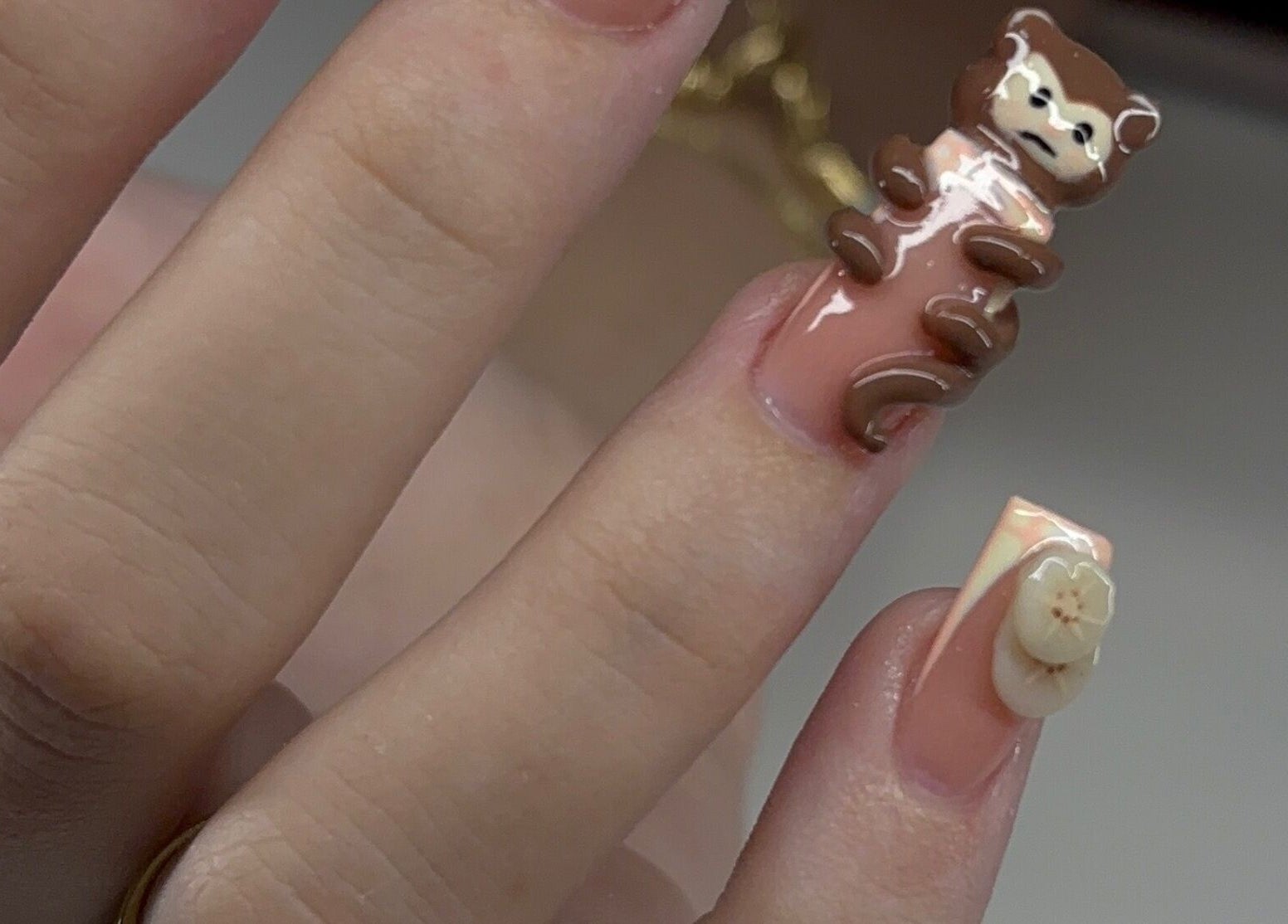 Unique bear nail art at Devine Essence, Willemstad, CW, showcases creative manicure designs.