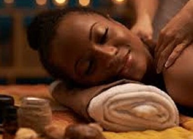 Woman enjoying a rejuvenating massage at Fabulaze Beauty Studio, Cape Town, Western Cape, ZA.