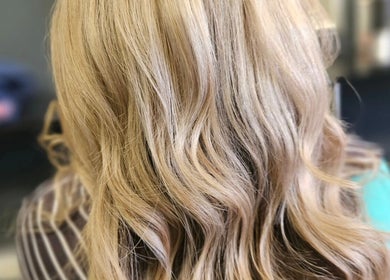 Blonde wavy hairstyle at Fabulaze Beauty Studio, Cape Town, Western Cape, ZA.