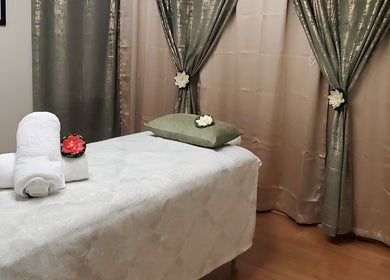 Relaxing massage room at Chaba Thai Massage LLC in Bethesda, MD, US, featuring tranquil decor and plush linens.