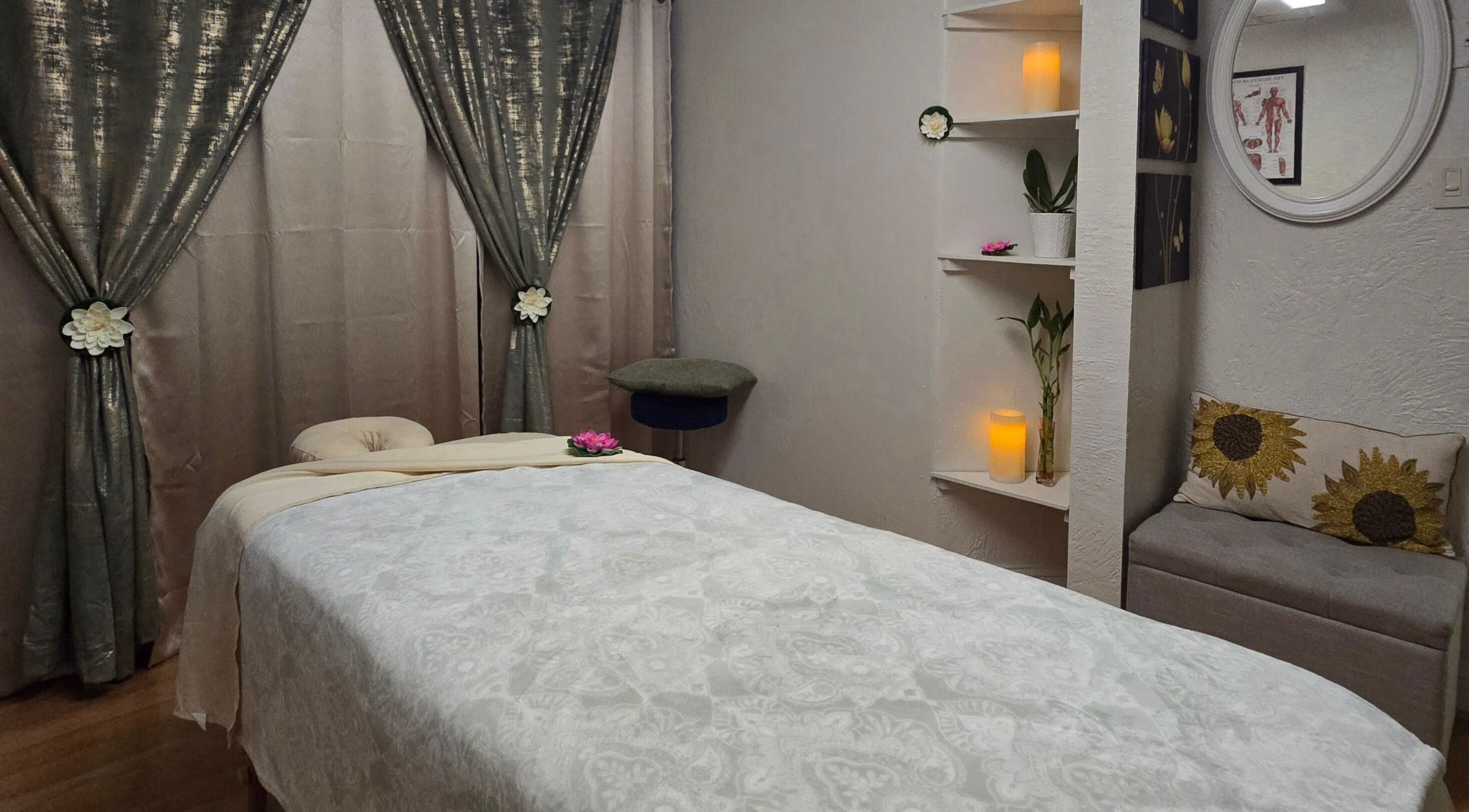 Serene massage room at Chaba Thai Massage LLC in Bethesda, MD, US with elegant decor and calming ambiance.
