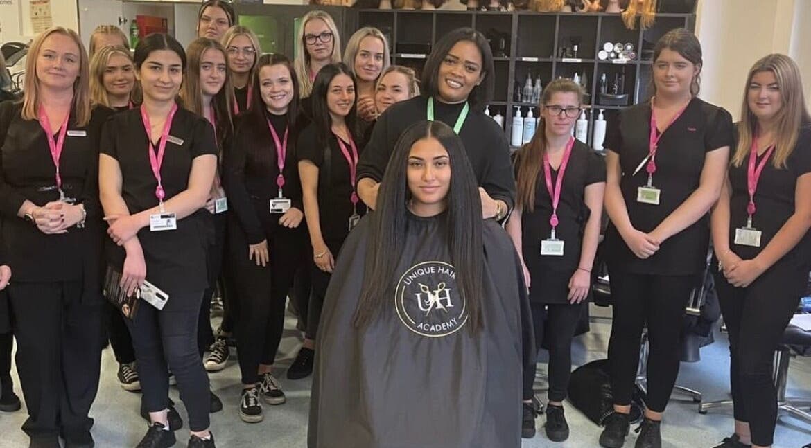 Group of students at Unique Hair Academy Limited, Stoke-on-Trent, England, GB, showcasing their skills.