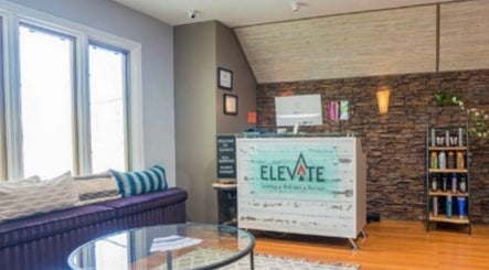 Reception at Tan'd by Alena, Mamaroneck, New York, showcasing a cozy, rustic-chic atmosphere.