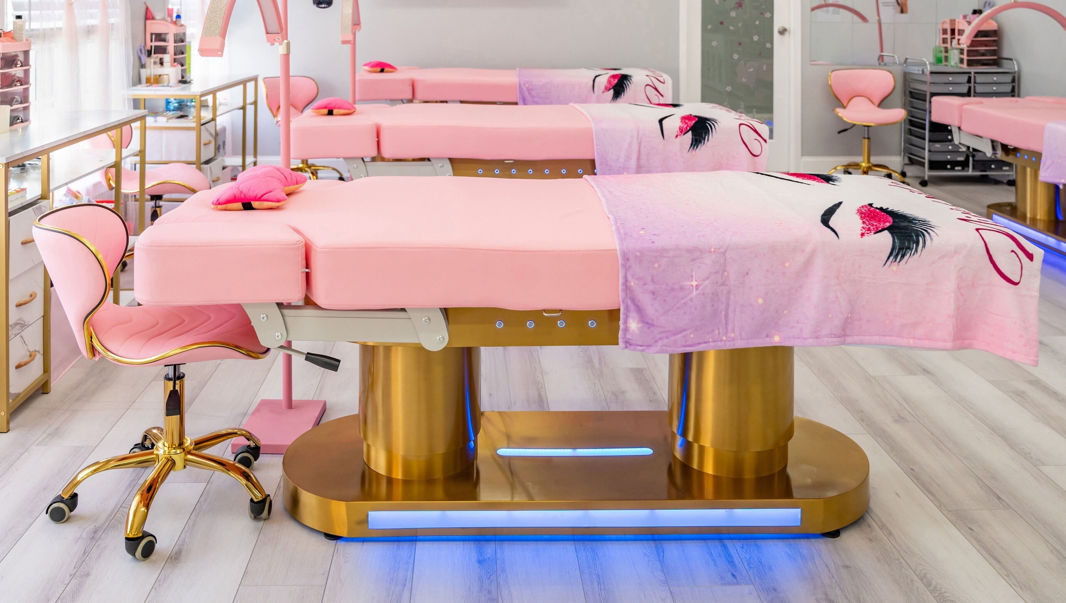 Luxurious pink treatment beds at Lash and Spa ByNeda, Vienna, VA, US, providing a calming wellness experience.