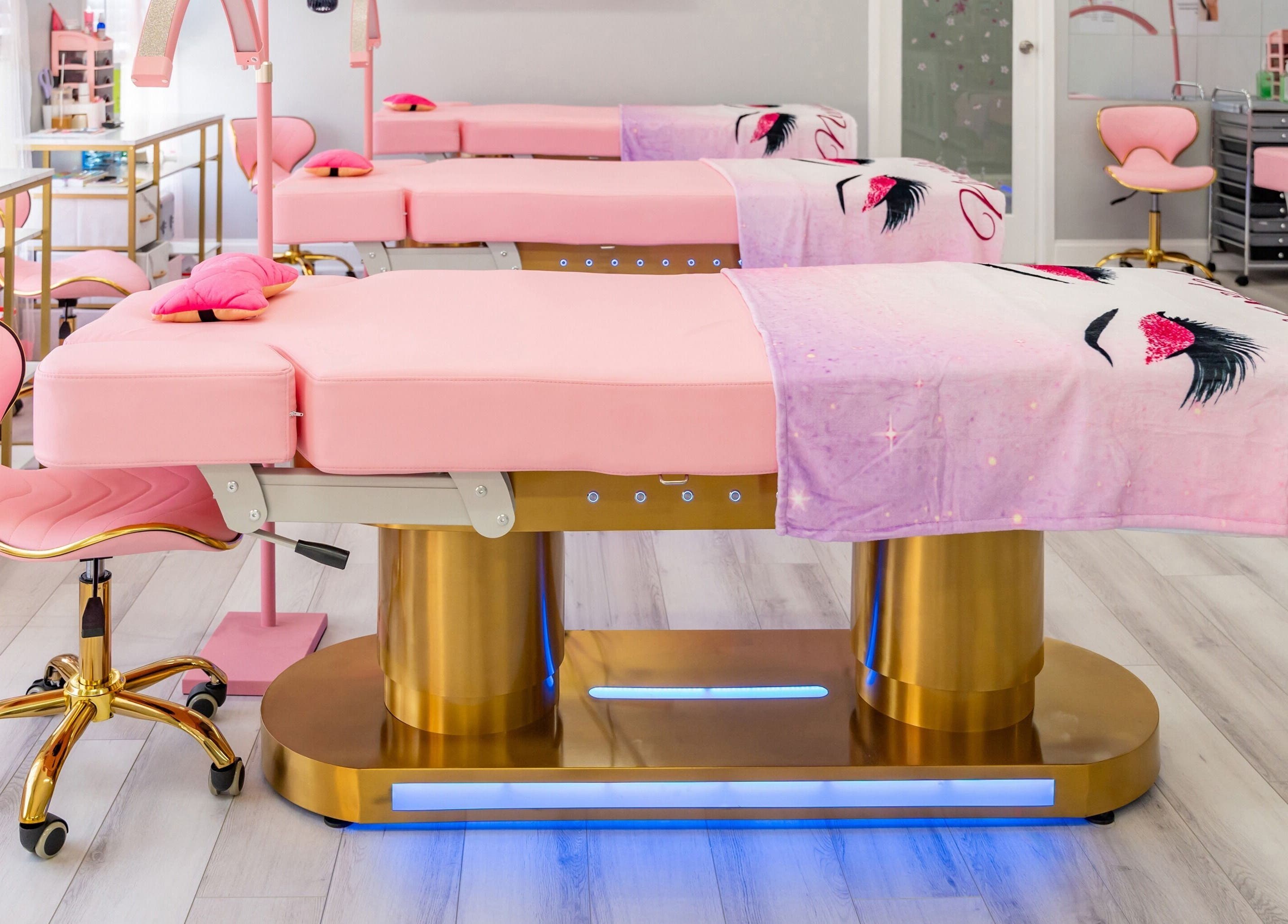 Luxurious pink treatment beds at Lash and Spa ByNeda, Vienna, VA, US, providing a calming wellness experience.