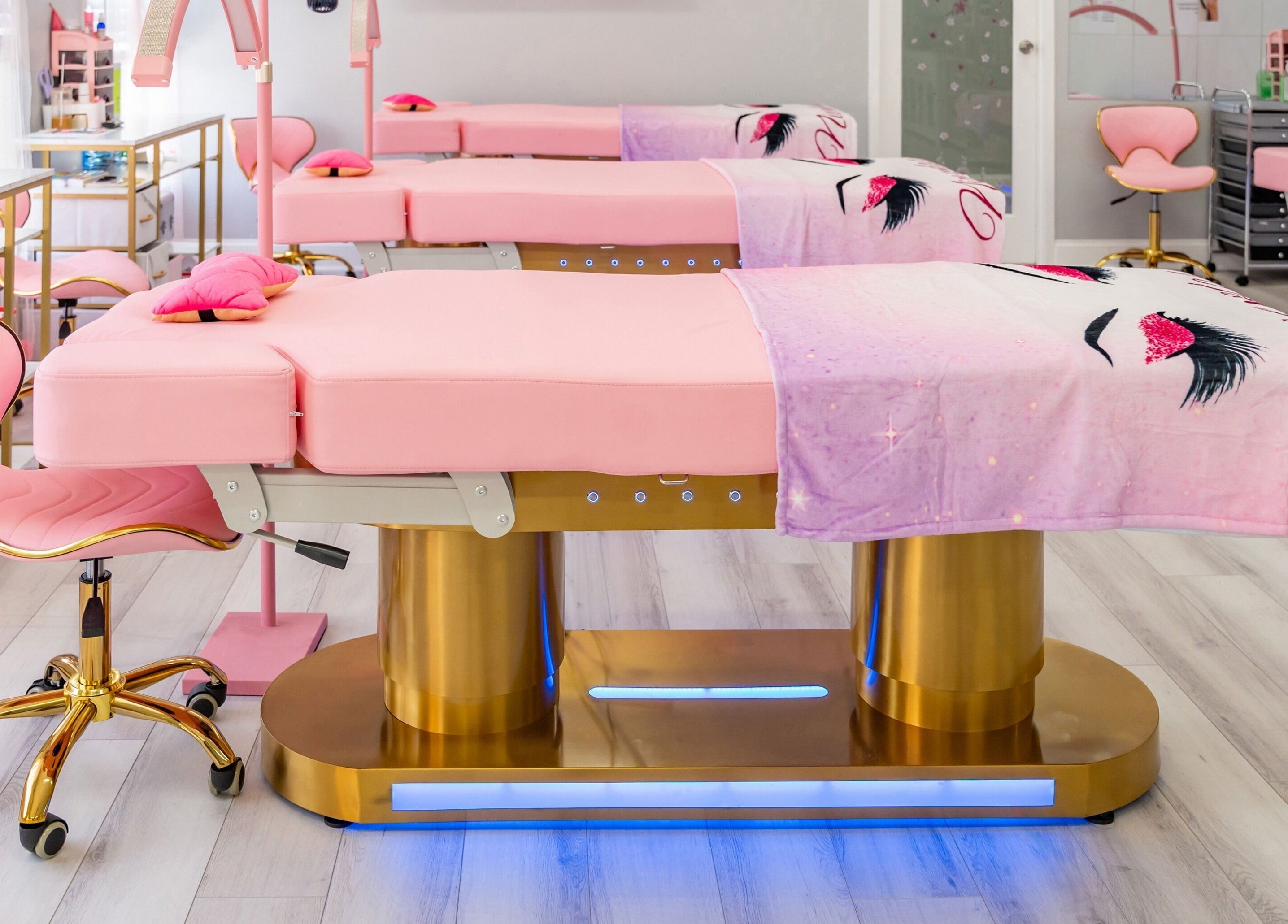 Luxurious pink treatment beds at Lash and Spa ByNeda, Vienna, VA, US, providing a calming wellness experience.