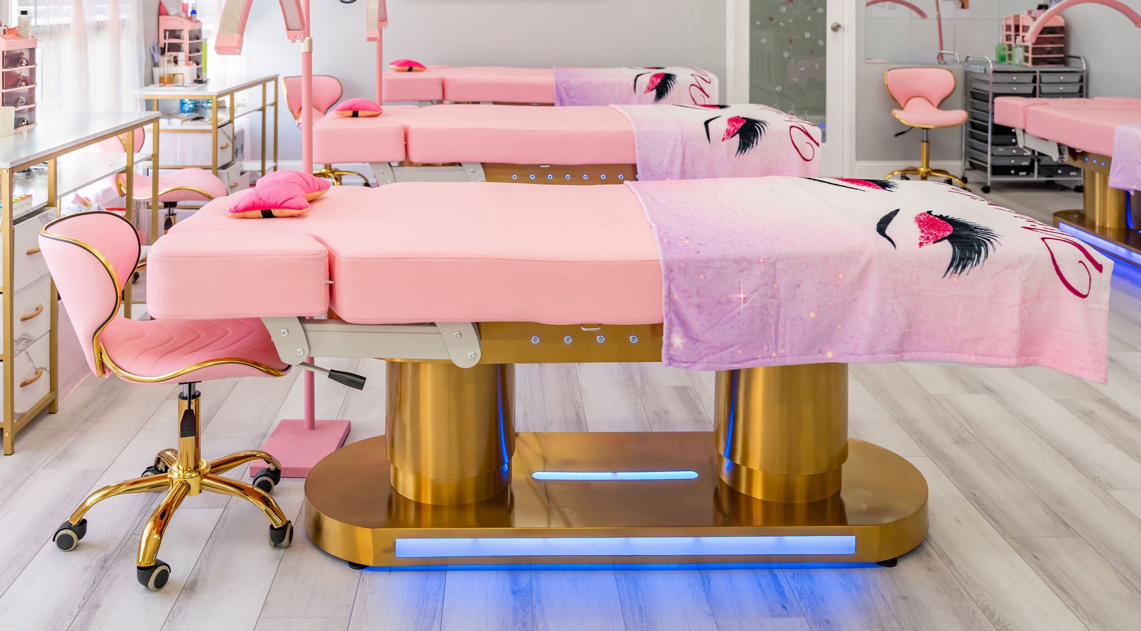 Luxurious pink treatment beds at Lash and Spa ByNeda, Vienna, VA, US, providing a calming wellness experience.