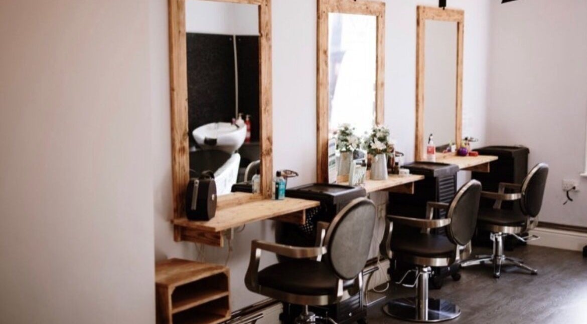 Stylish salon chairs and mirrors at No 92 Hair and Beauty, Bridlington, England, GB.