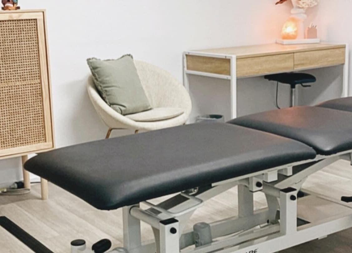 Cozy treatment room at Nxt Level Integrated Health Pty Ltd, Bundall, Queensland, AU, featuring a massage table.