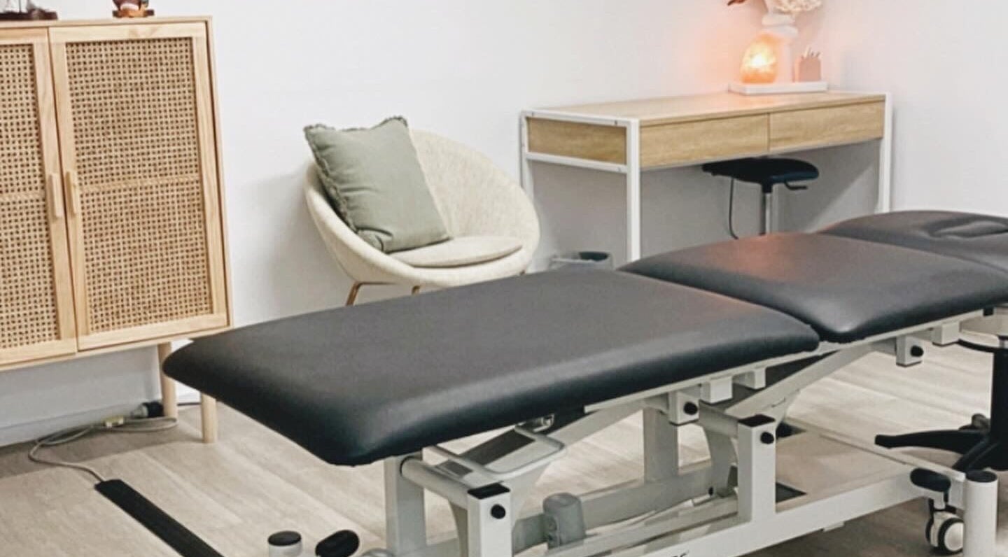 Cozy treatment room at Nxt Level Integrated Health Pty Ltd, Bundall, Queensland, AU, featuring a massage table.