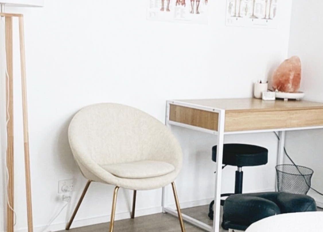 Inviting consultation room at Nxt Level Integrated Health Pty Ltd in Bundall, Queensland, AU, featuring a cozy chair.
