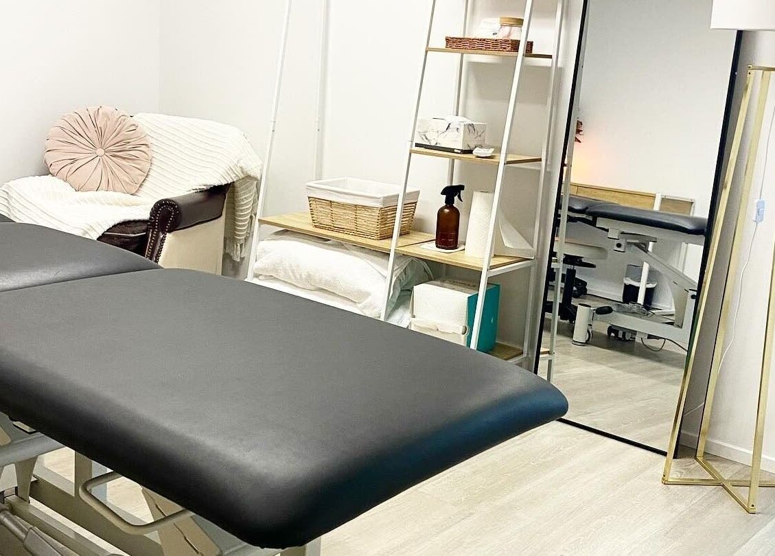 Modern therapy room at Nxt Level Integrated Health Pty Ltd, Bundall, Queensland, AU, featuring massage table.