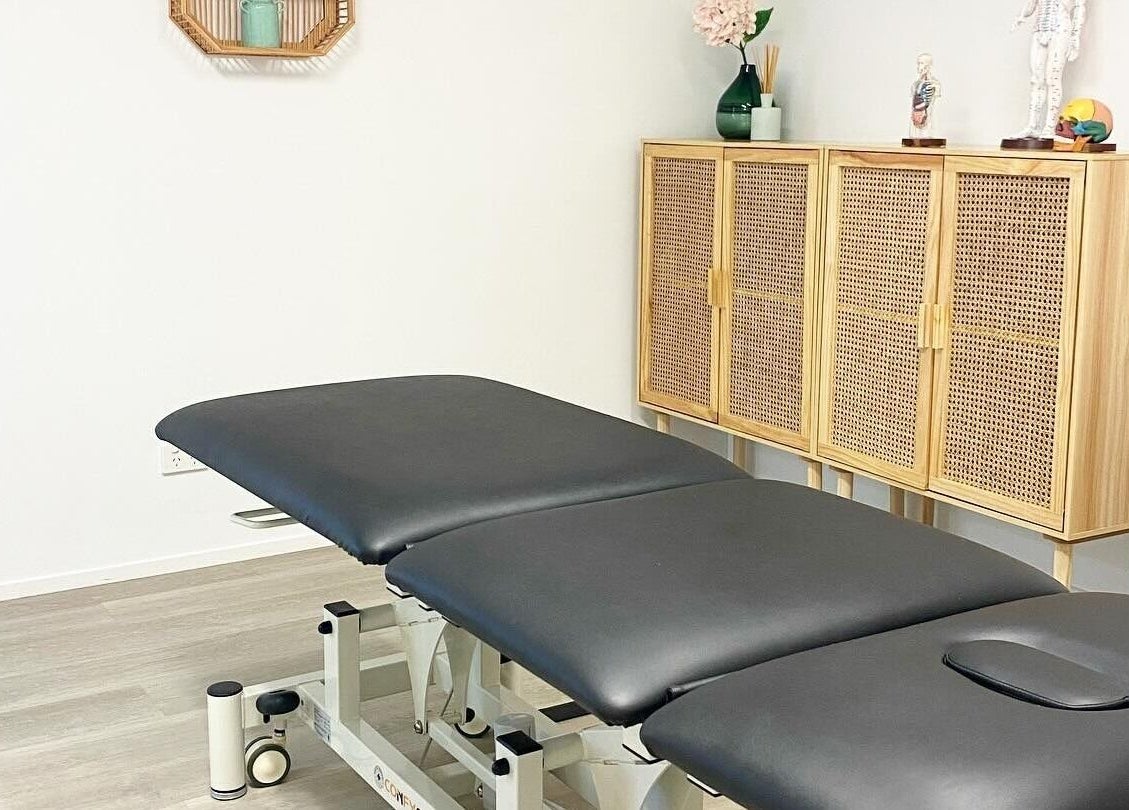 A tranquil therapy room at Nxt Level Integrated Health Pty Ltd, Bundall, Queensland, AU with massage table.