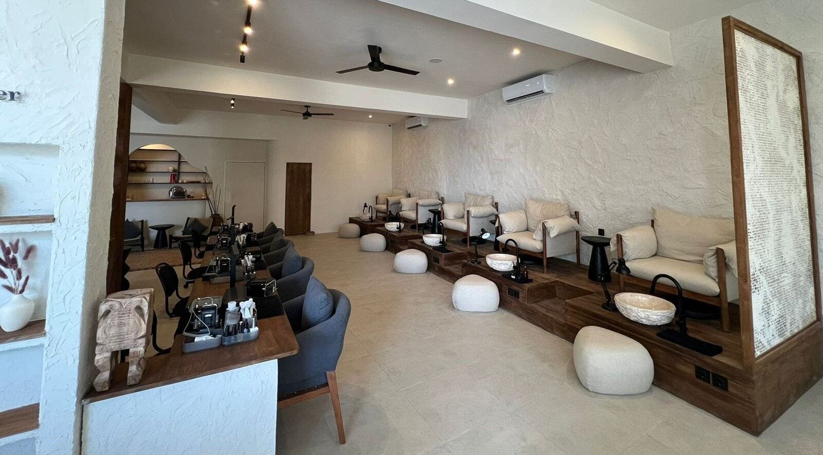 Cozy pedicure chairs and sleek decor at Sounds Of Sun spa in Bali, Bali, ID.