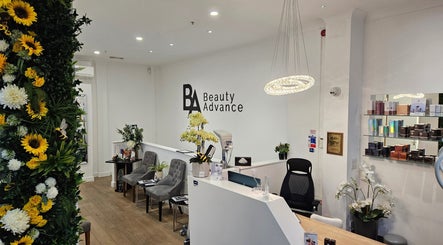 Elegant reception of Beauty Advance Skin & Laser Clinic with floral decor in Cardiff, Wales, GB.