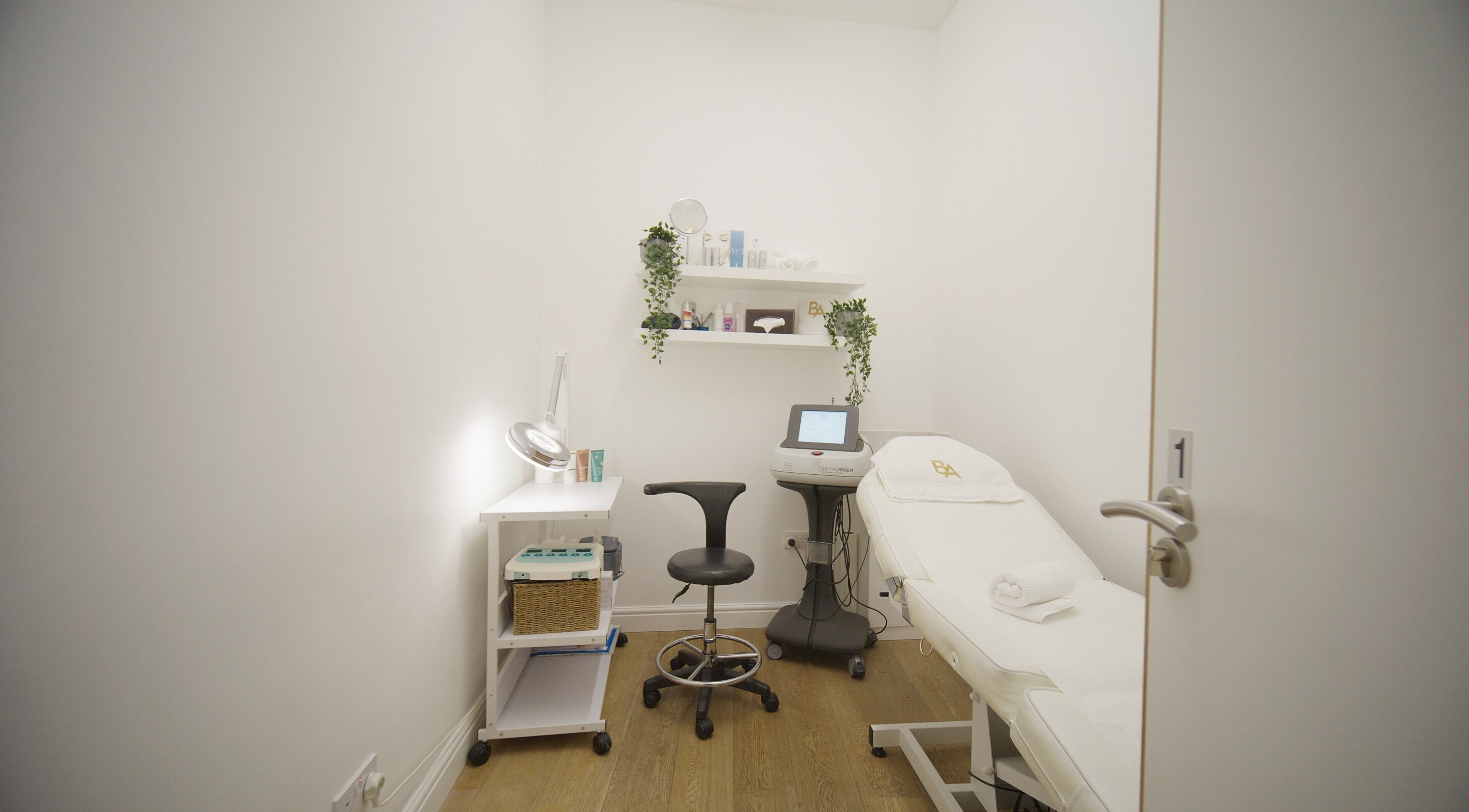 Serene treatment room at Beauty Advance Skin & Laser Clinic, Cardiff, Wales, GB, featuring a modern aesthetic.