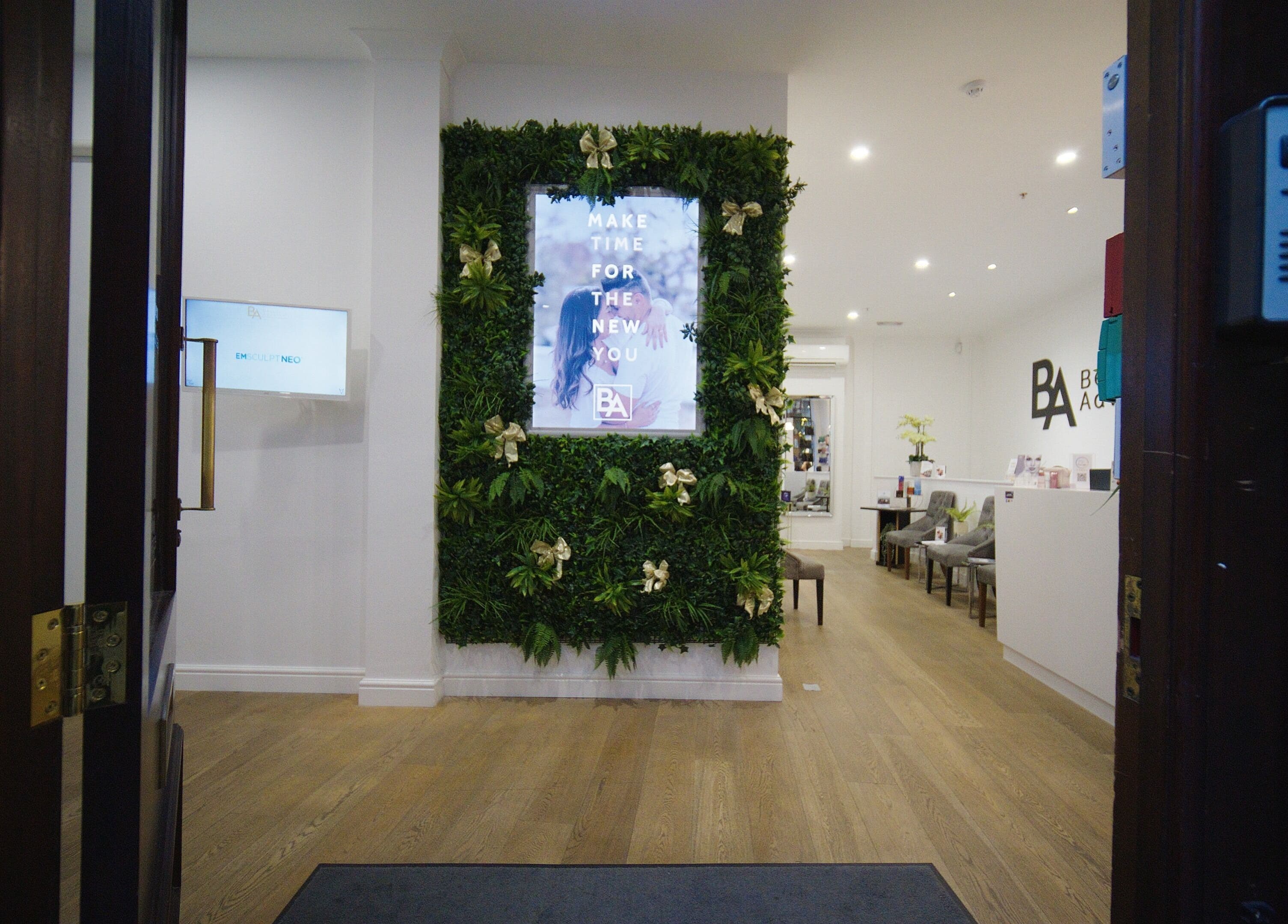 Entrance to Beauty Advance Skin & Laser Clinic in Cardiff, Wales, GB with vibrant green decor and inviting ambiance.