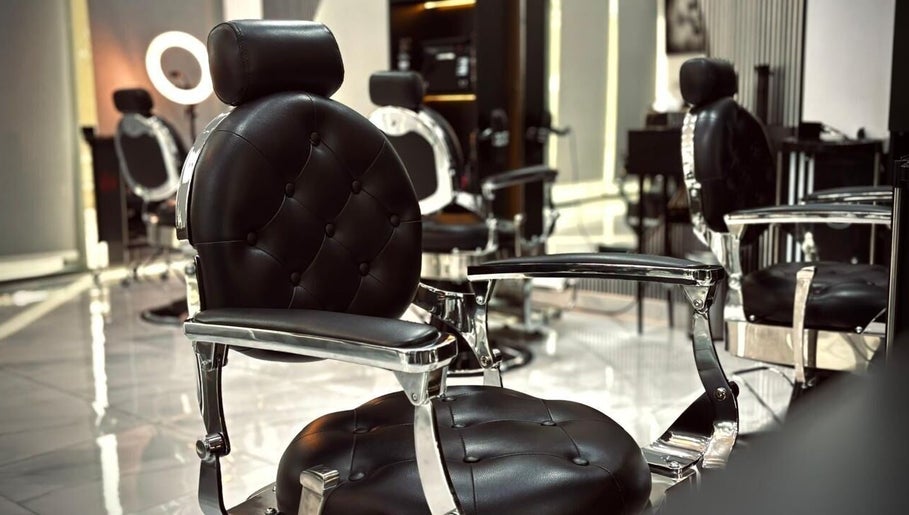 Luxurious barber chairs at Royal Shave Barber in Dubai, AE, offering premium grooming services.
