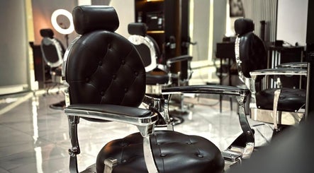 Luxurious barber chairs at Royal Shave Barber in Dubai, AE, offering premium grooming services.