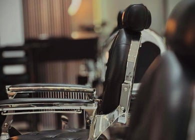 Luxurious barber chair at Royal Shave Barber in Dubai, AE, offering premium grooming services.