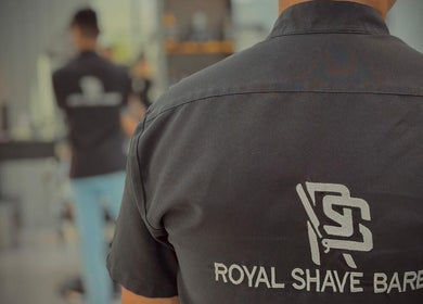 Back view of Royal Shave Barber uniform with logo in Dubai, AE.