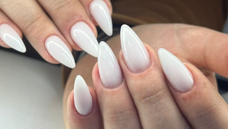 Stylish white almond-shaped nails at Salon@735, Pretoria, Gauteng, ZA showcasing expert nail design.
