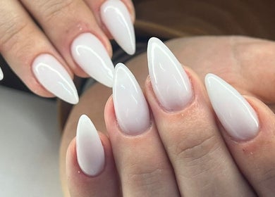 Stylish white almond-shaped nails at Salon@735, Pretoria, Gauteng, ZA showcasing expert nail design.