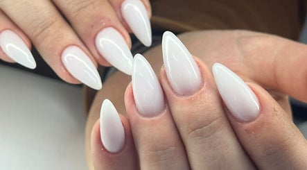 Stylish white almond-shaped nails at Salon@735, Pretoria, Gauteng, ZA showcasing expert nail design.