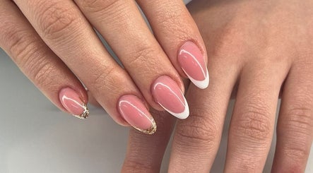 Stylish pink and white manicure at Salon@735 in Pretoria, Gauteng, ZA.