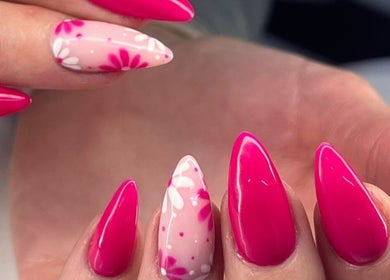 Vibrant floral pink nail art at Salon@735, Pretoria, Gauteng, ZA showcasing elegant design.