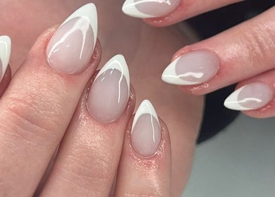 Elegant French manicure at Salon@735, Pretoria, Gauteng, ZA offering top-notch nail care services.