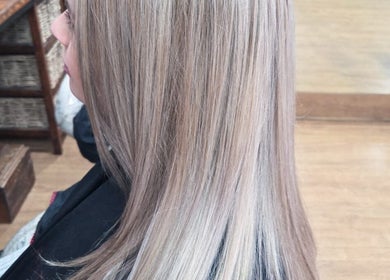 Smooth, sleek hair styled at Salon@735 in Pretoria, Gauteng, ZA, showcasing a professional finish.
