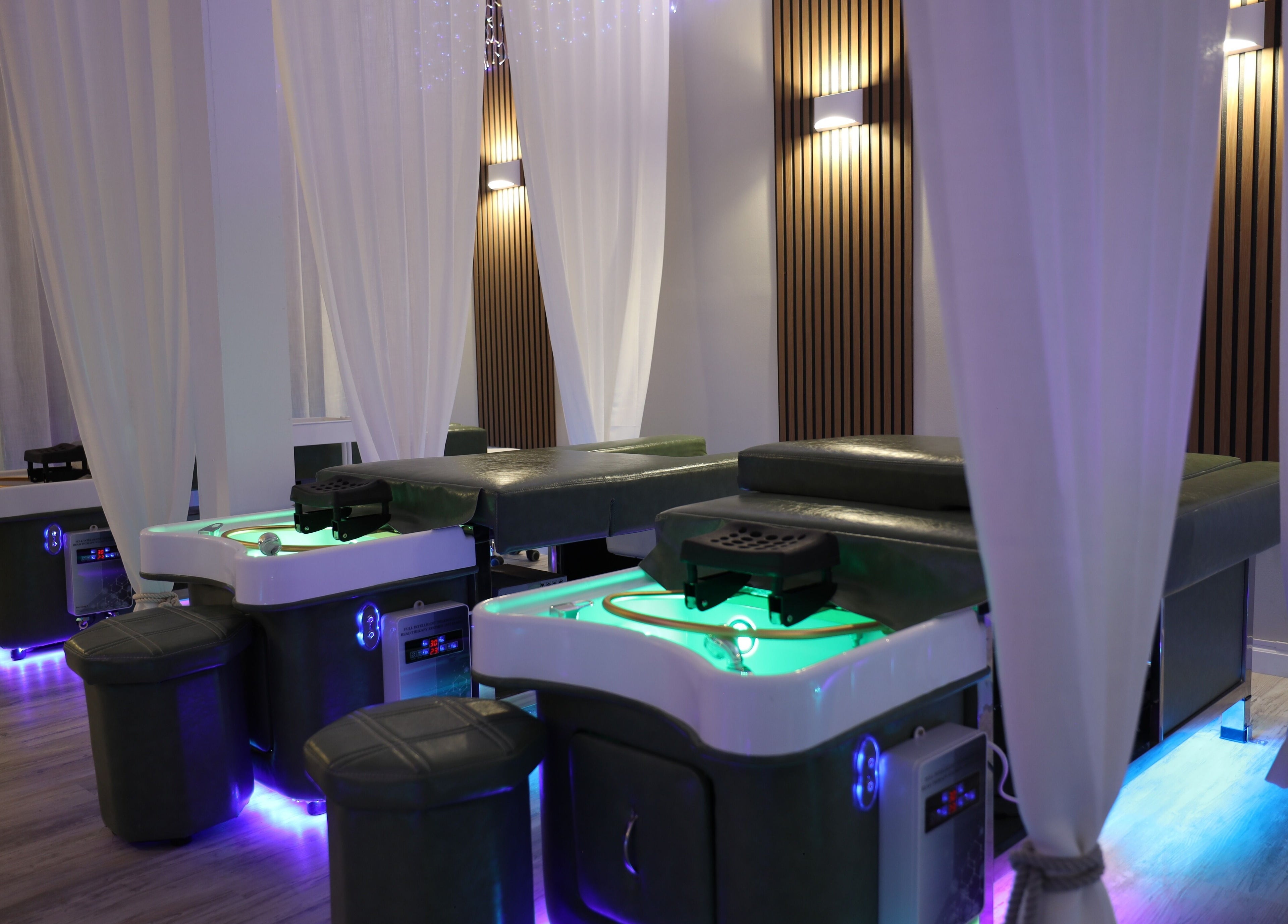 Luxury massage tables at Above the Shoulders Below the Knees SPA in Marietta, Georgia, US, in a serene setting.