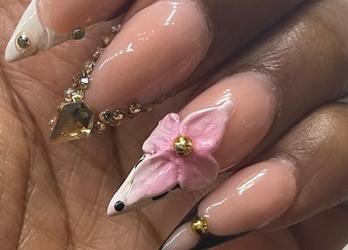 Intricate floral nail art with gems at Nail Kulture, Rochdale, England, GB.