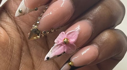 Intricate floral nail art with gems at Nail Kulture, Rochdale, England, GB.