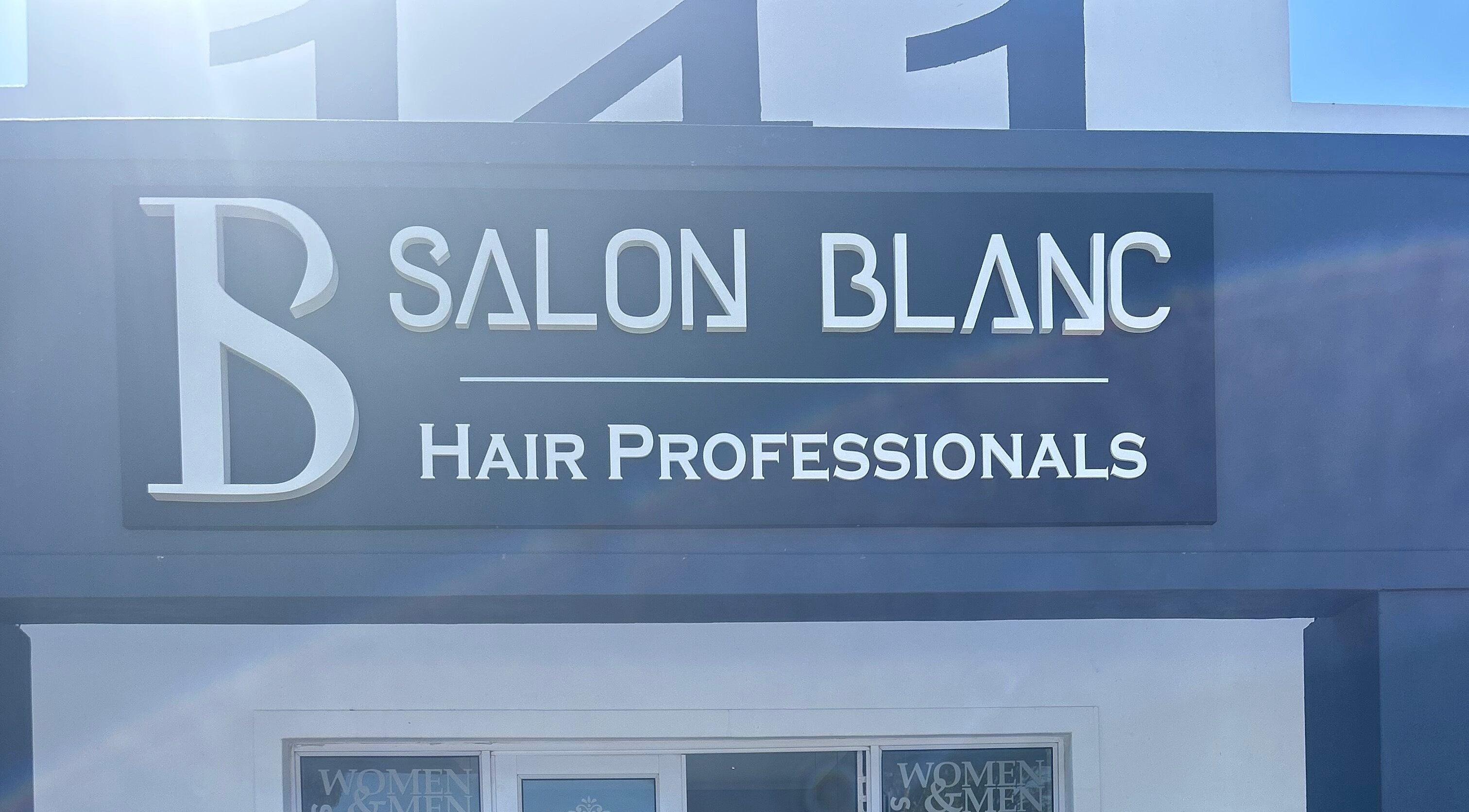 Front signage of Salon Blanc, Cape Town, Western Cape, ZA, showcasing its professional branding.