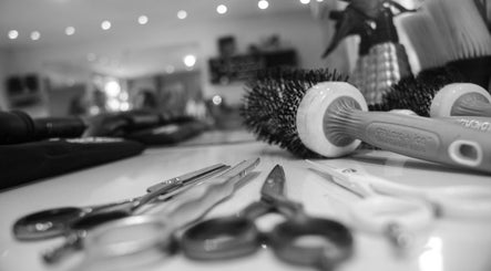 Close-up of styling tools at Salon Blanc, Cape Town, Western Cape, ZA, showcasing a chic hairdressing setup.
