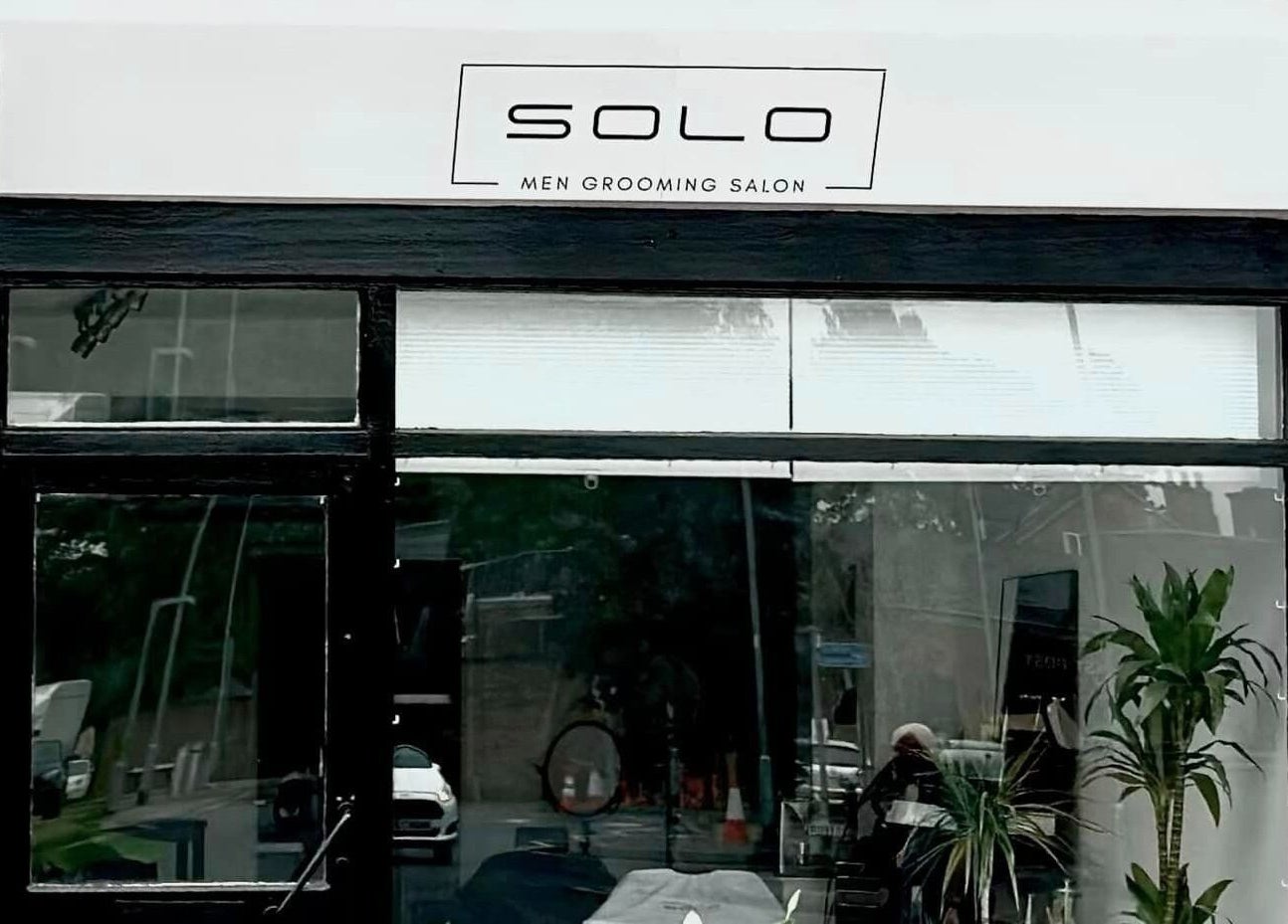 Exterior of Solomengroomingsalon in Beeston, England, GB, showcasing modern storefront design.