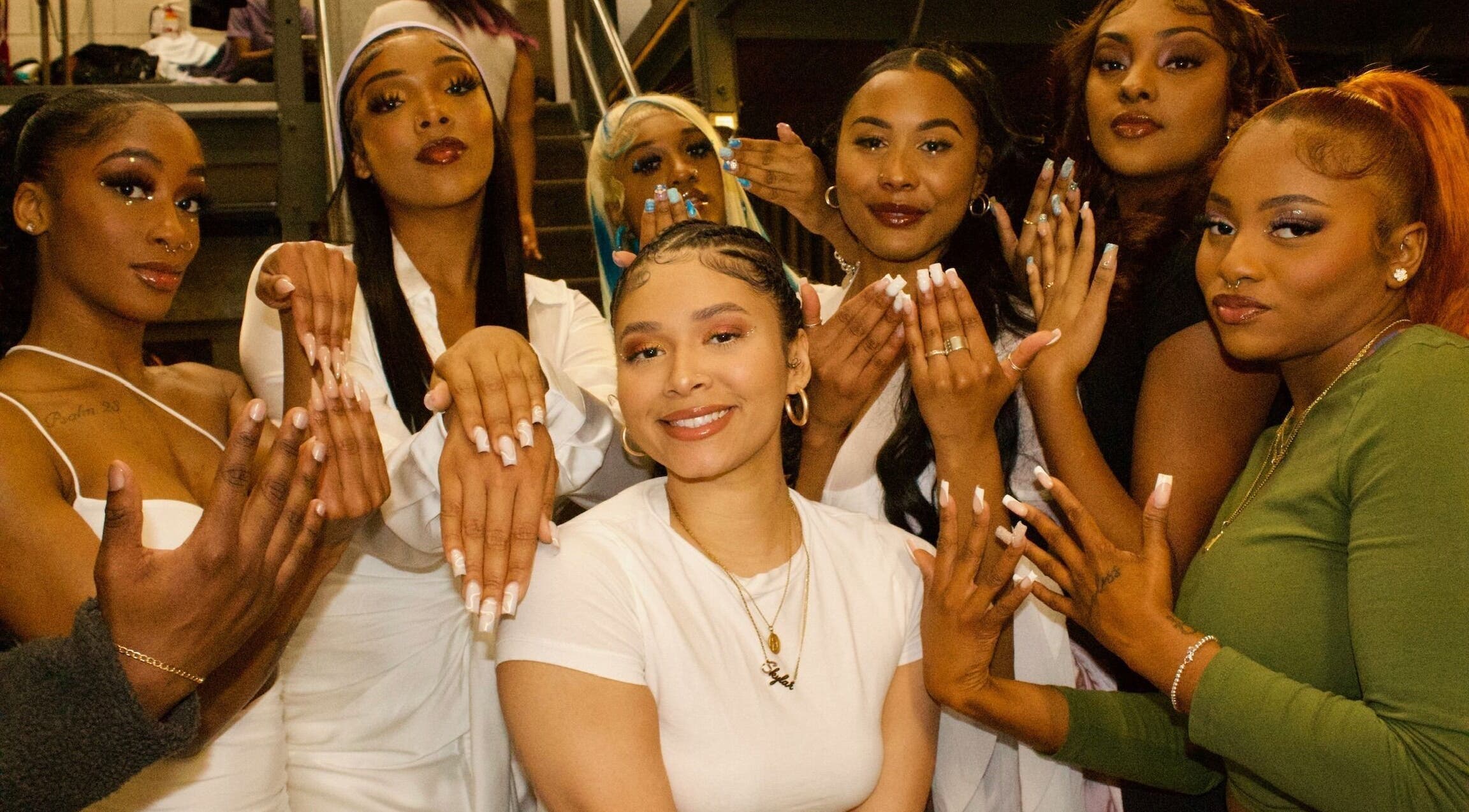 Stylish group showcasing nail art at NailedbySky, Clifton, New Jersey, US.