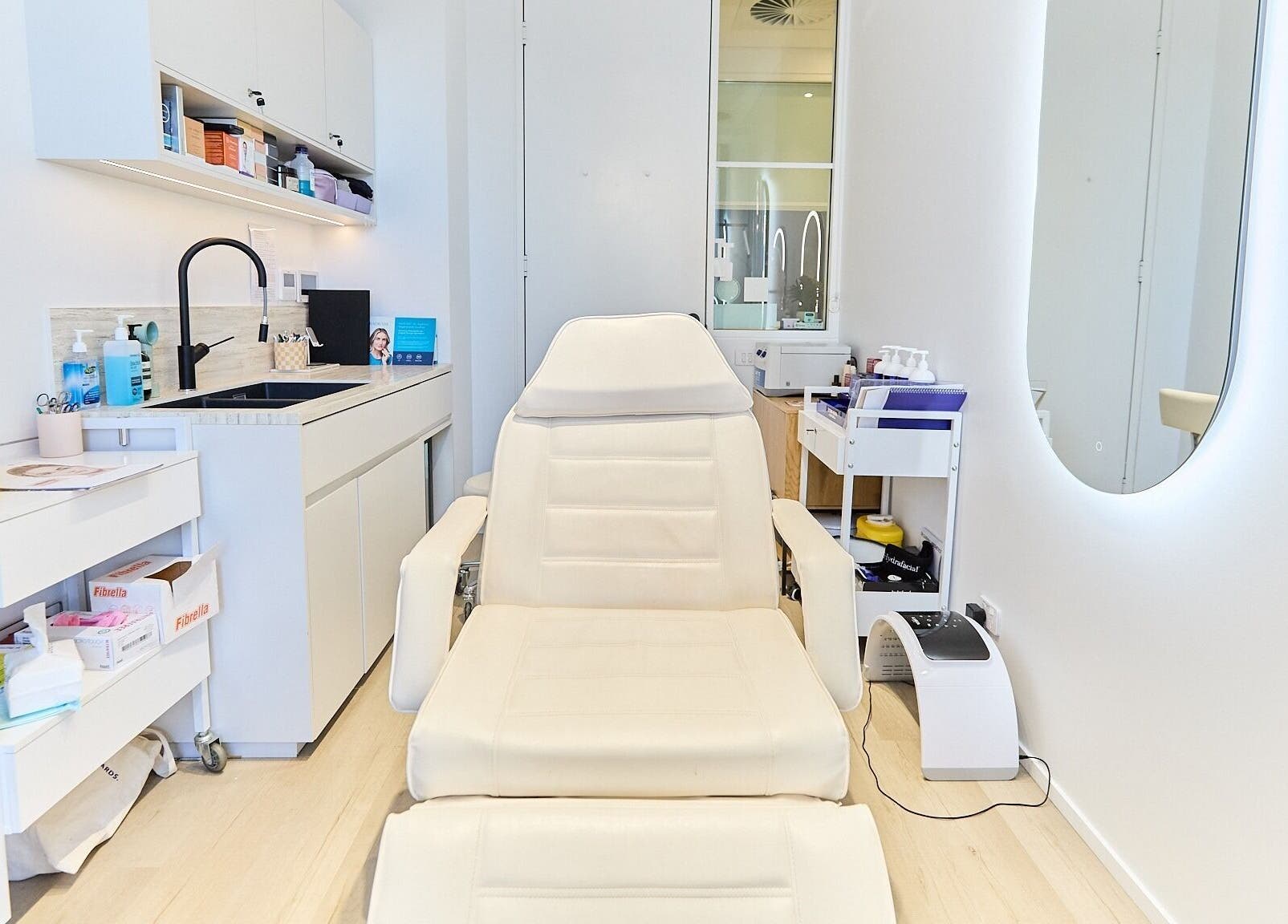 Inviting treatment room at Cosmetics By Nurse Blake, Bondi Junction, New South Wales, AU with modern amenities.