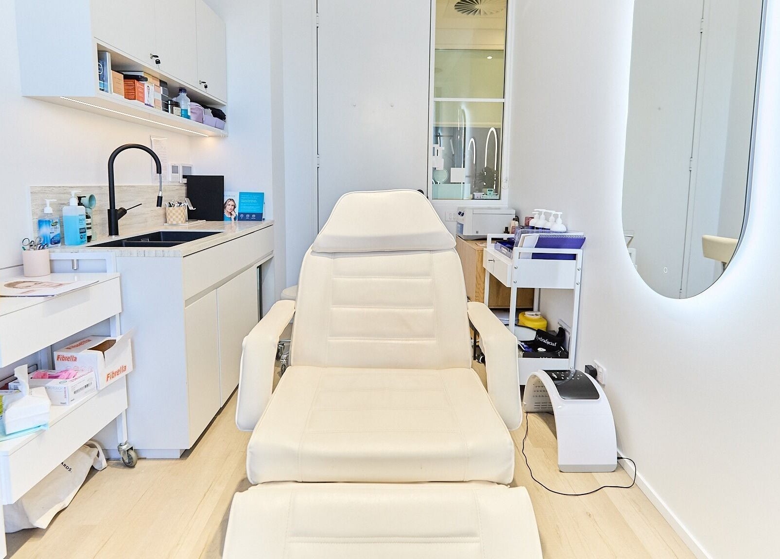 Inviting treatment room at Cosmetics By Nurse Blake, Bondi Junction, New South Wales, AU with modern amenities.