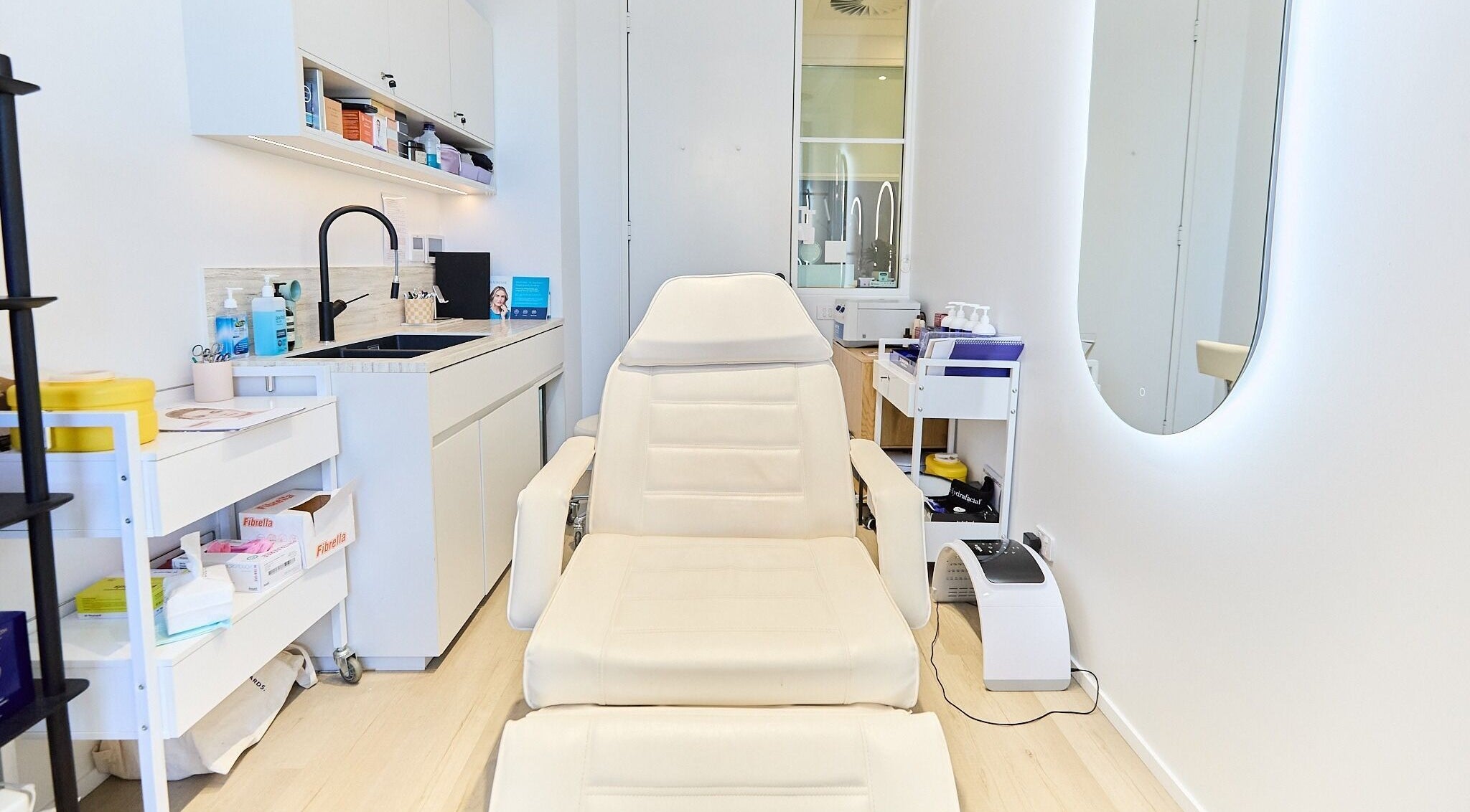 Inviting treatment room at Cosmetics By Nurse Blake, Bondi Junction, New South Wales, AU with modern amenities.