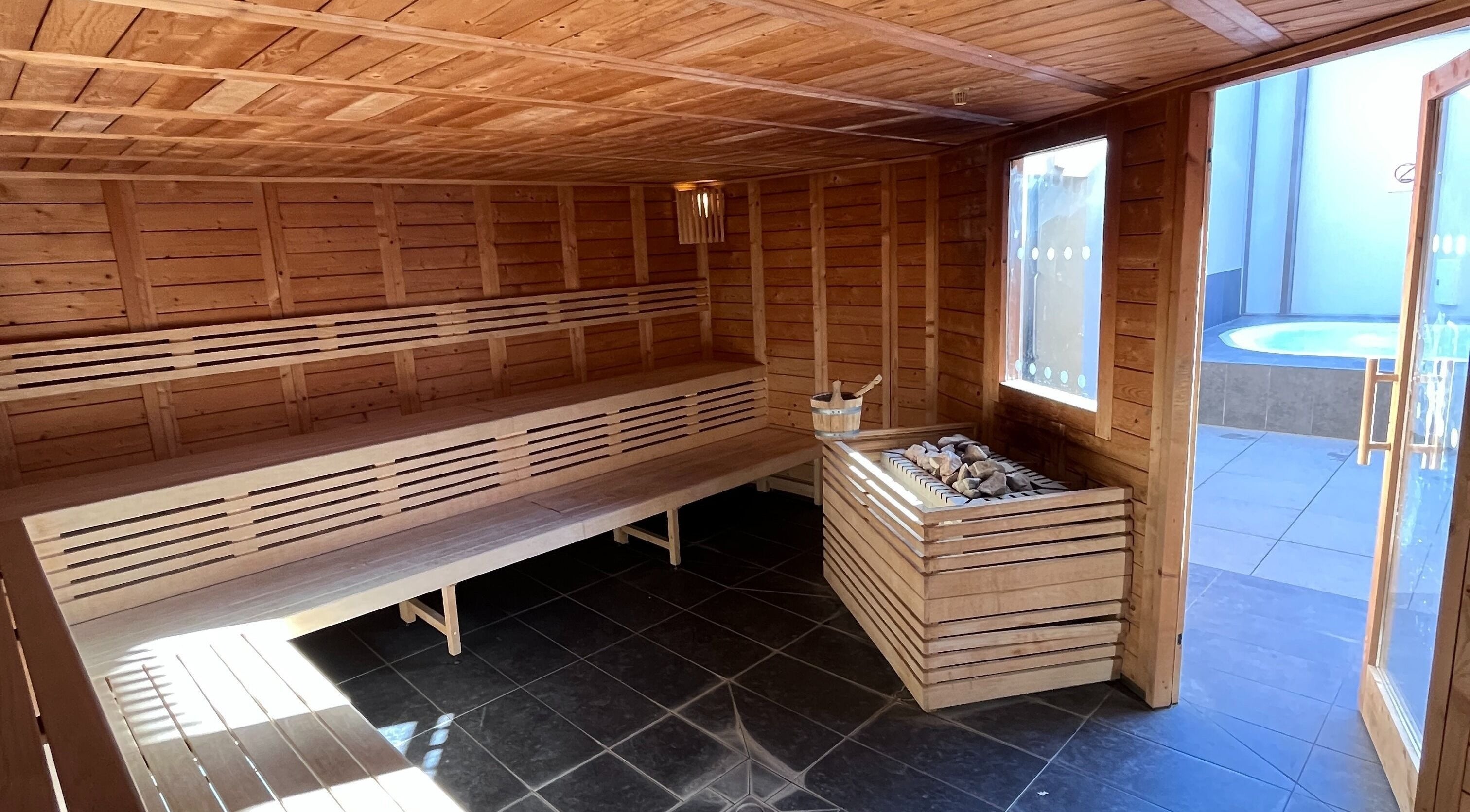 Warm wooden sauna at Spa Arzana in Rueil-malmaison, Île-de-france, FR for a relaxing experience.