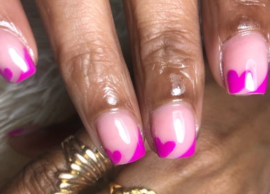 Vibrant pink heart nails designed at Studio Lady Garnet, Port of Spain, Port of Spain Corporation, TT.