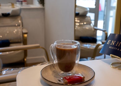 Relaxing setting with coffee at Enhance Taunton, a beauty salon in Taunton, England, GB.
