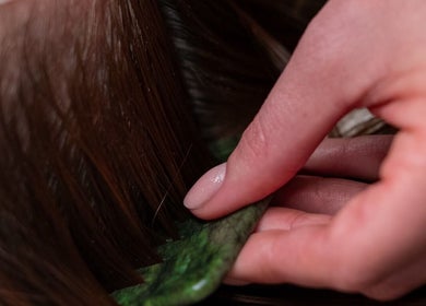 Hair treatment at Enhance Taunton, Taunton, England, GB, showcasing sleek and shiny results.