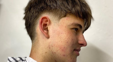Profile view of a stylish taper haircut at Meister Fades, Cape Town, Western Cape, ZA.