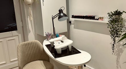 Manicure station at Beauty By Jen, Newcastle upon Tyne, England, GB, featuring a cozy chair and elegant design.