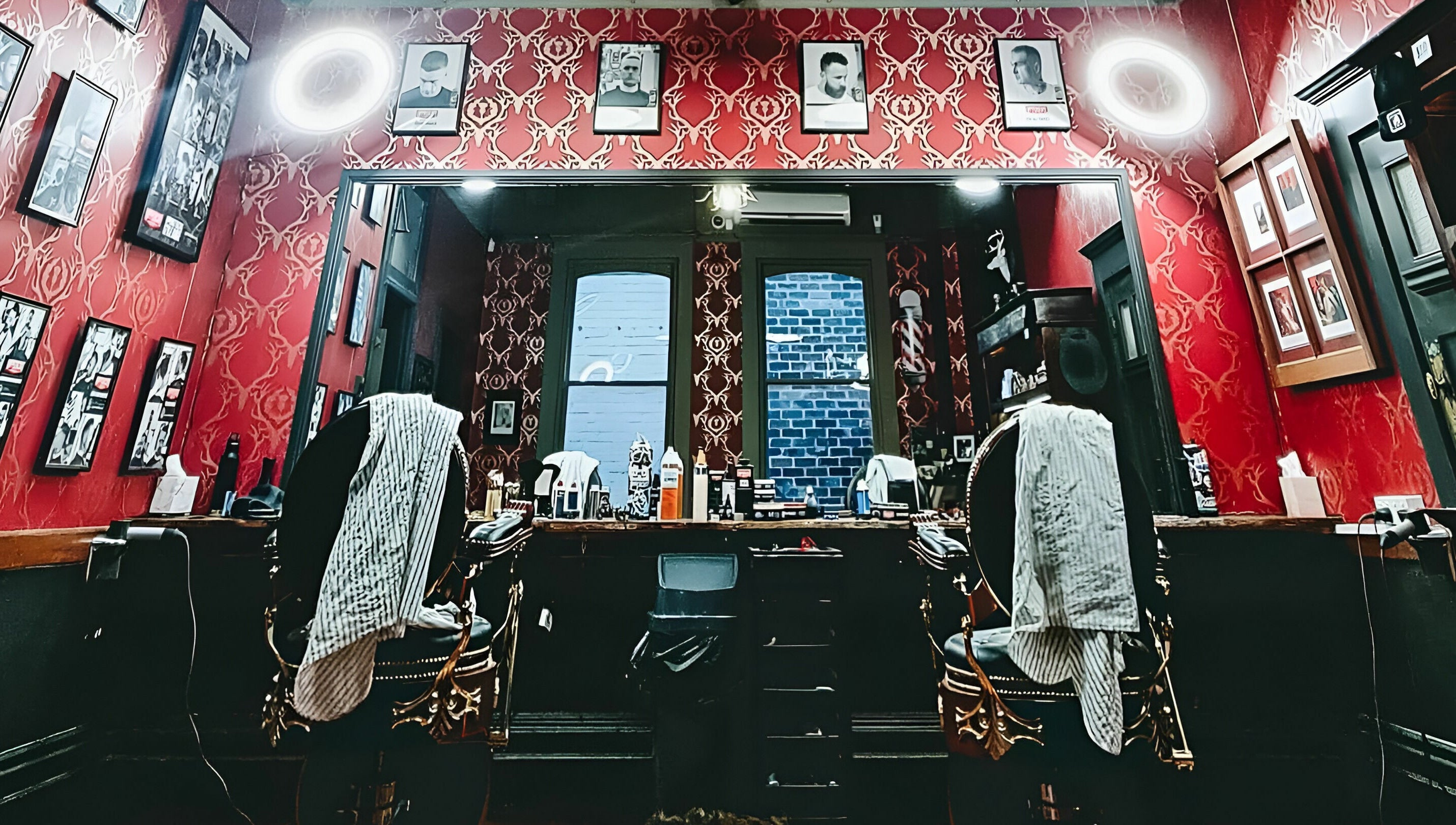 Interior of The Kingsway Barbershop in Launceston, Tasmania, AU with vintage decor and barber chairs.