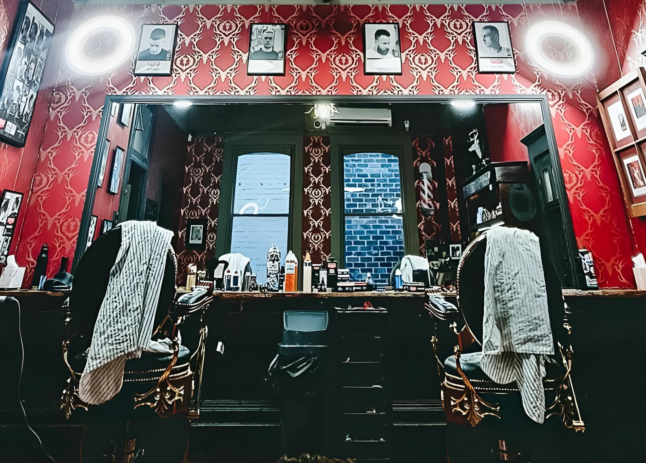 Interior of The Kingsway Barbershop in Launceston, Tasmania, AU with vintage decor and barber chairs.